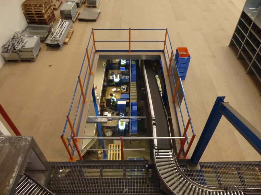mezzanine floor in warehouse with conveyors