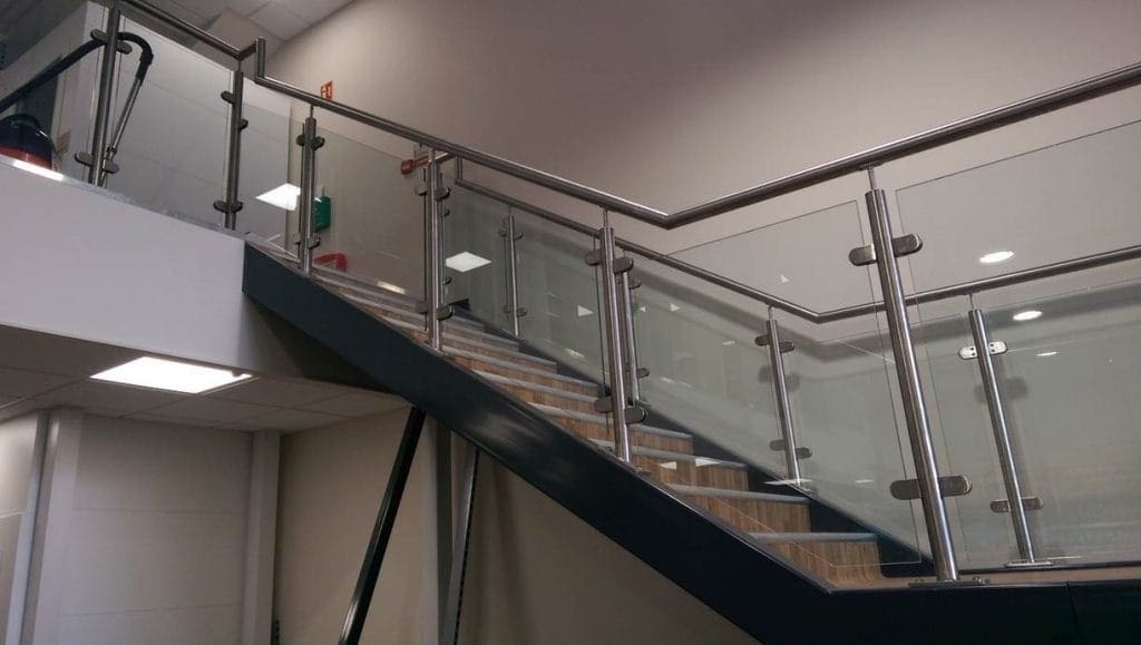 mezzanine staircase with glass and stainless steel