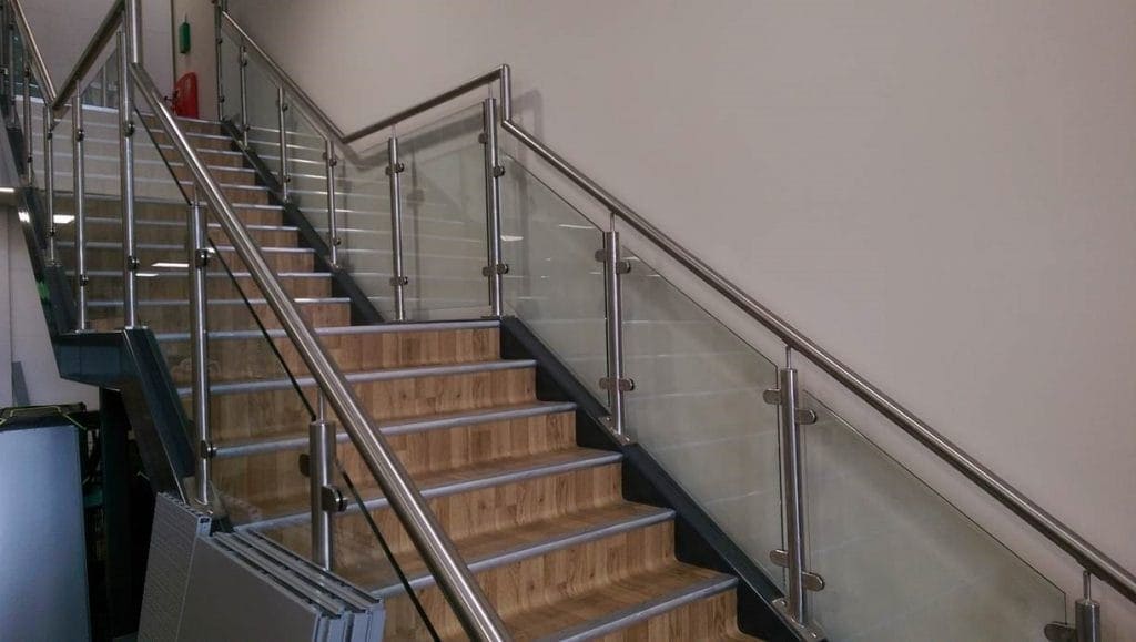 mezzanine staircase with glass and stainless steel