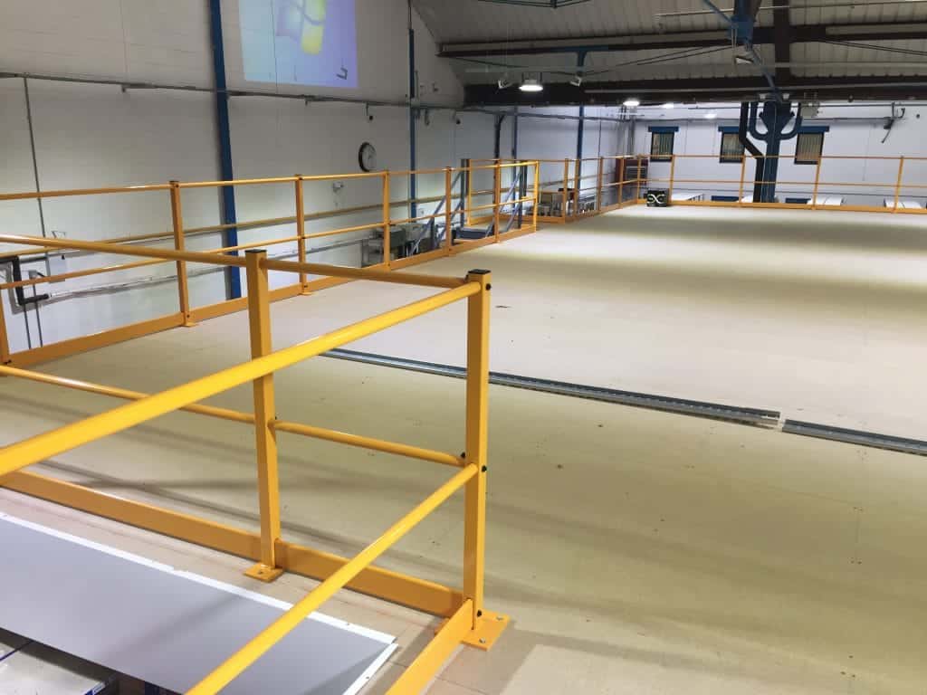mezzanine floor with yellow edge protection