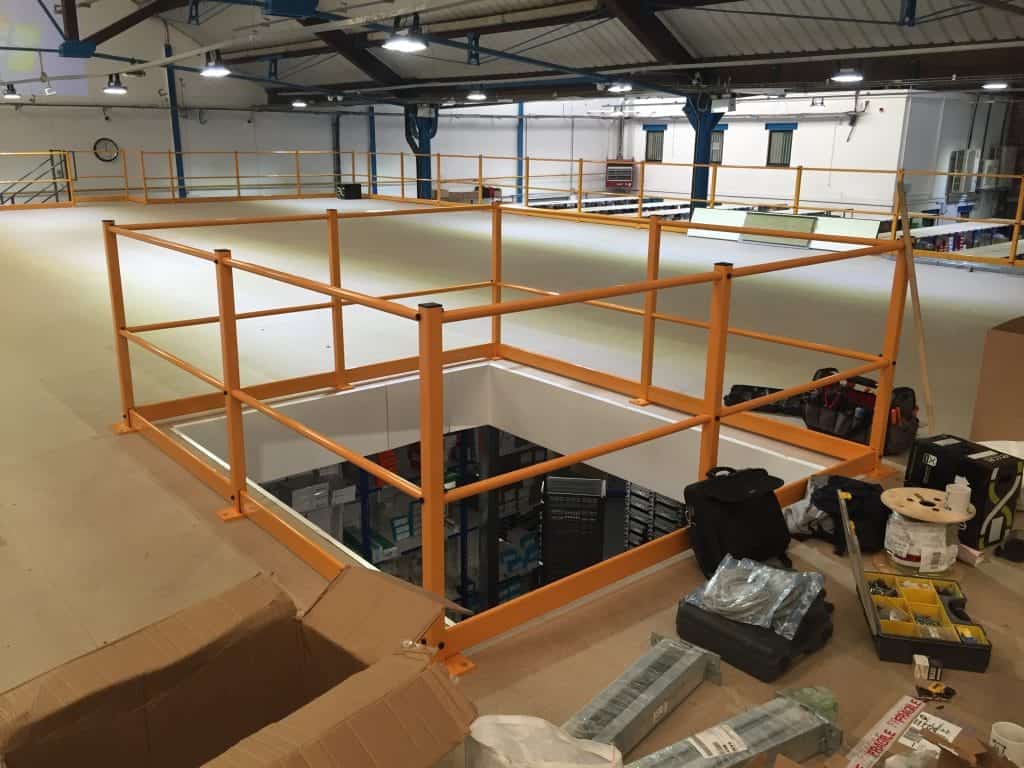 mezzanine floor with yellow edge protection