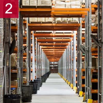 aisle of warehouse with pallet racking