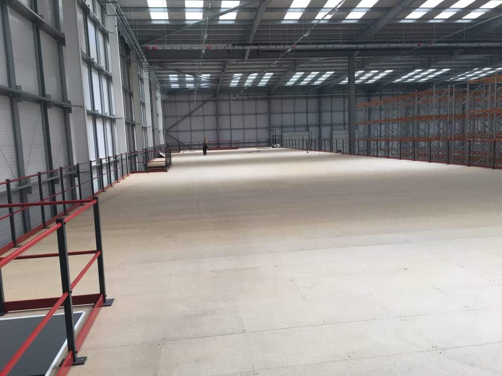 large empty mezzanine floor in warehouse building