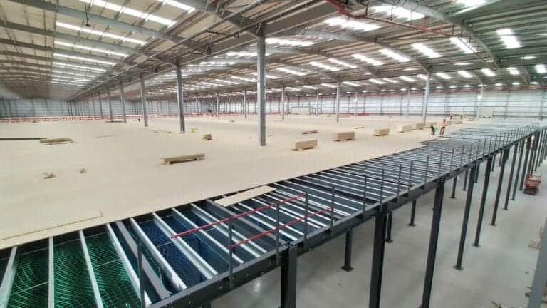 large mezzanine floor with decking installation being completed