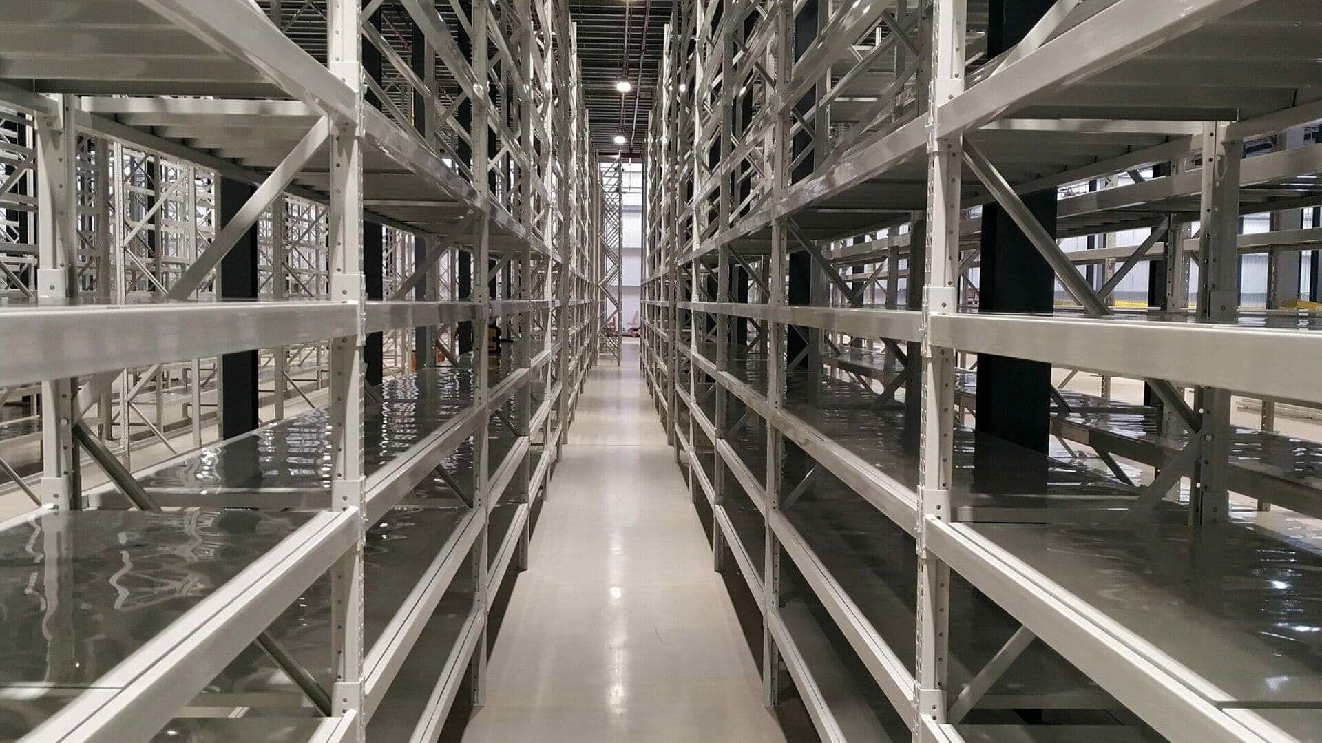 empty metal warehouse shelving