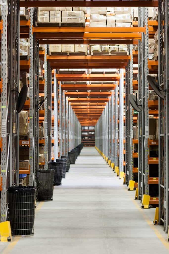 aisle of warehouse filled with stock