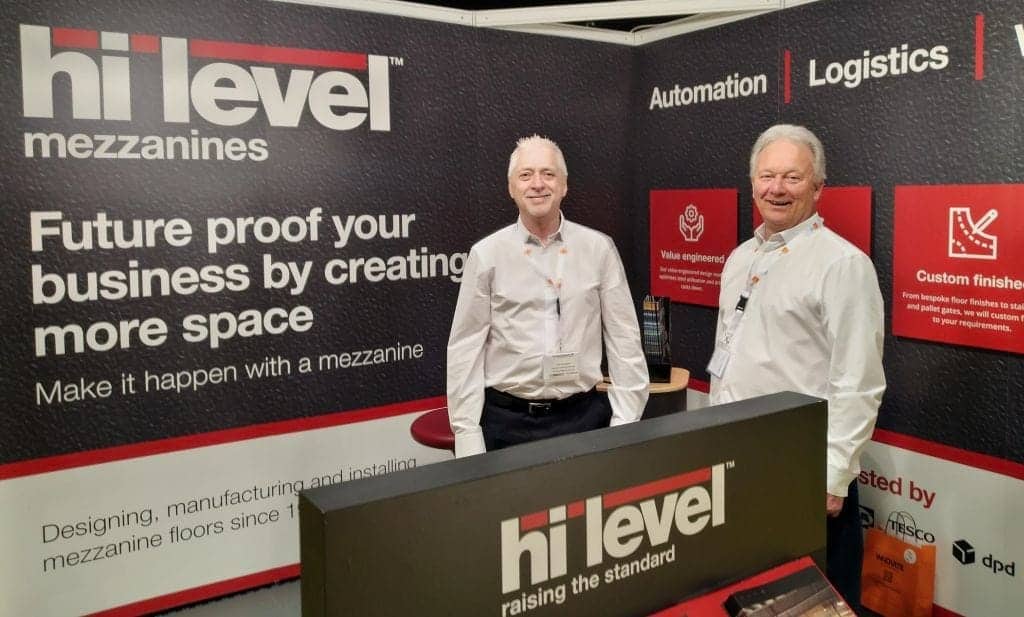 staff on hi-level mezzanines exhibition stand.