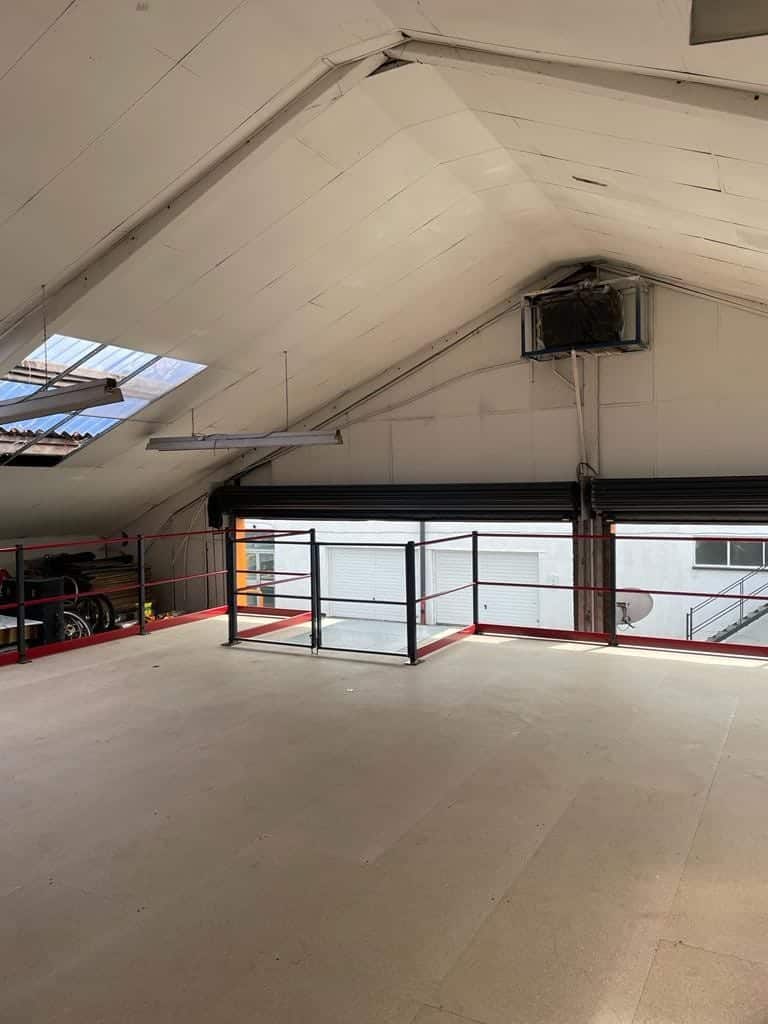 mezzanine floor with swing pallet gate