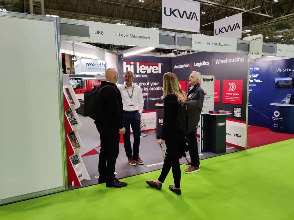 staff on hi-level mezzanines stand at exhibition
