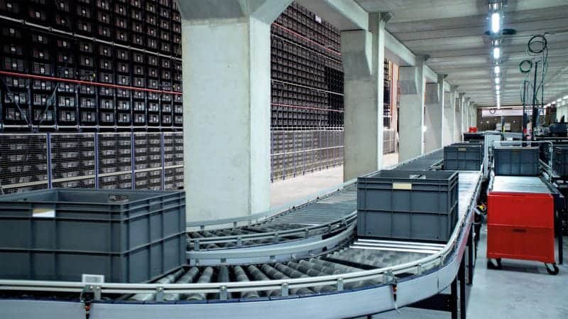 totes on warehouse conveyor system