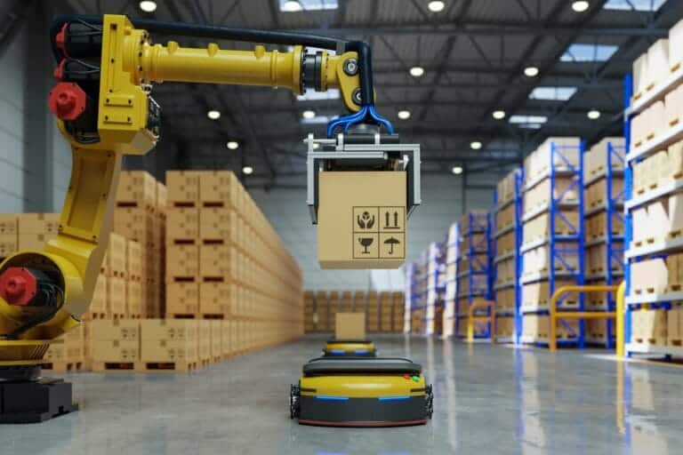 robotic arm putting parcel onto robot