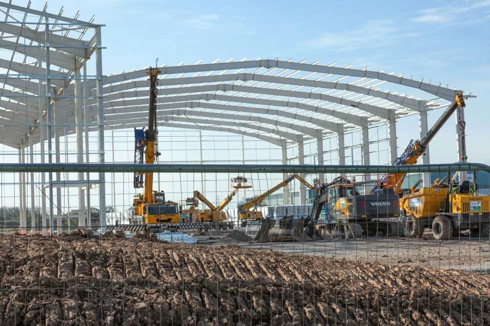warehouse construction site with machinery